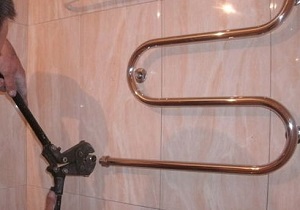 Демонтаж полотенцесушителя в ванной в Краснодаре